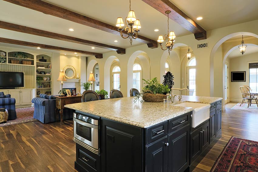 Luxury kitchen with large island and adjacent living room